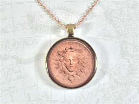 hermes medallion|hermes pendants for women.